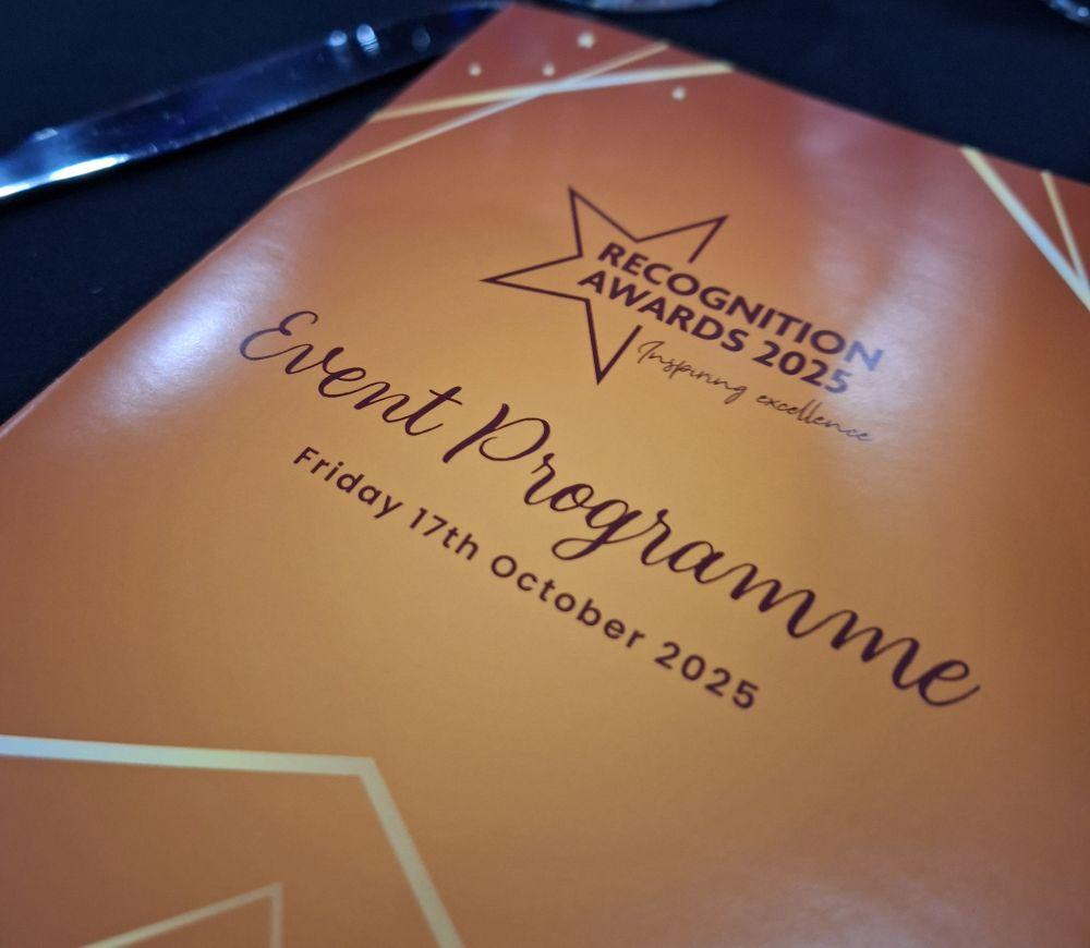 close up photo of the event programme