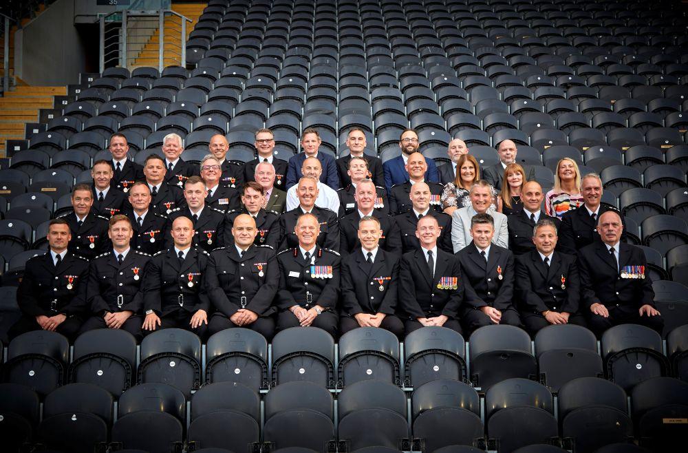 Long Service event in June 2026 with staff sat at MKM stadium