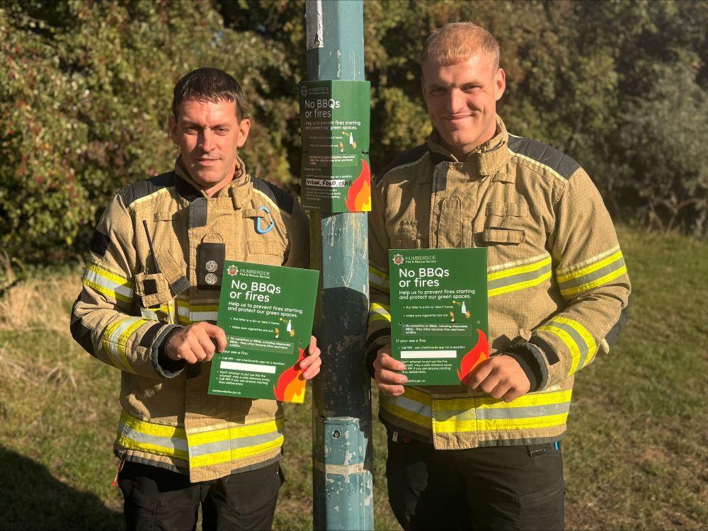 Firefighters with no bbqs or fires sign